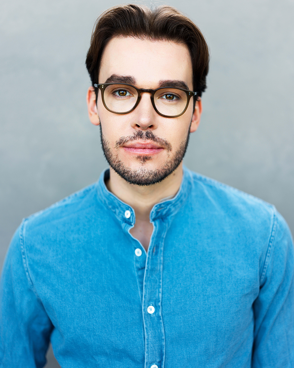 Austin Hammer - Blue Shirt with Glasses